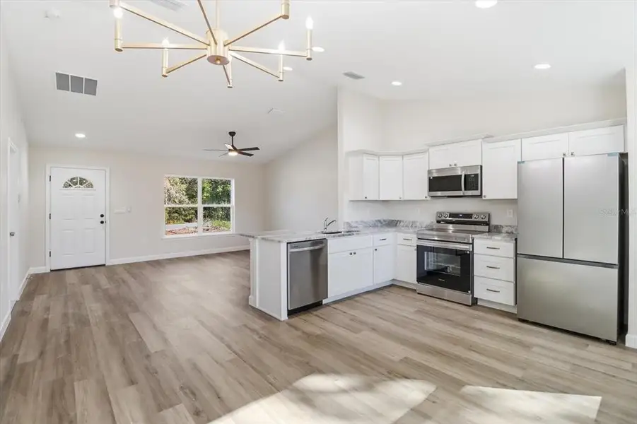 Furnished interior view inside a new home in , Citrus Springs (Image 11).