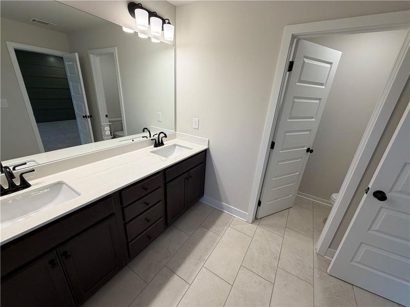 Furnished interior view inside a new home in Millstone at Mundy Mill, Gainesville (Image 9).