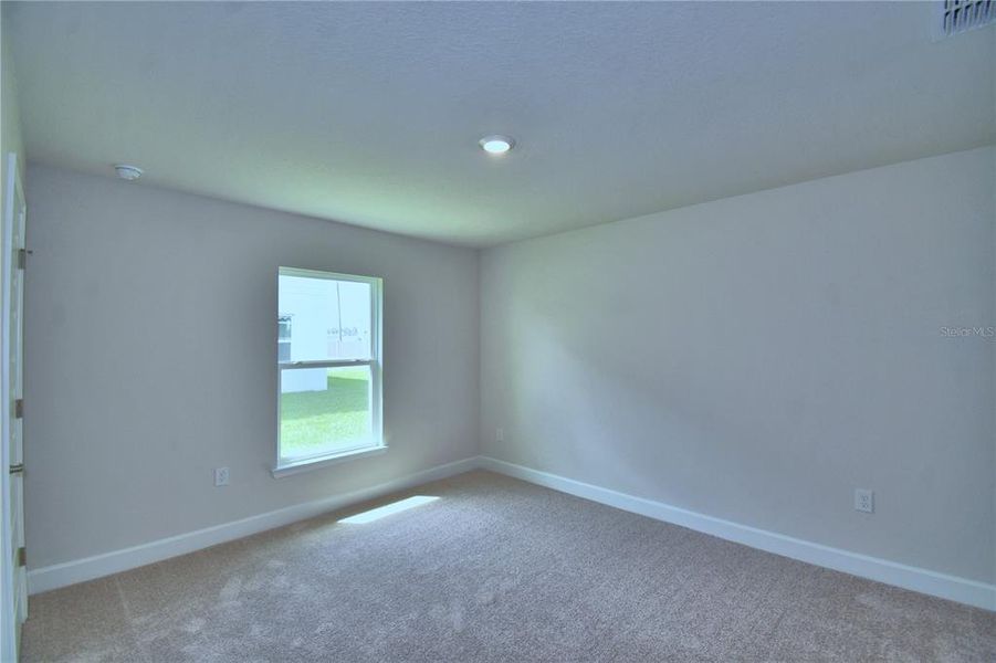 Spacious, unfurnished interior of a new home in Lake Juliana Estates, Auburndale (Image 29).