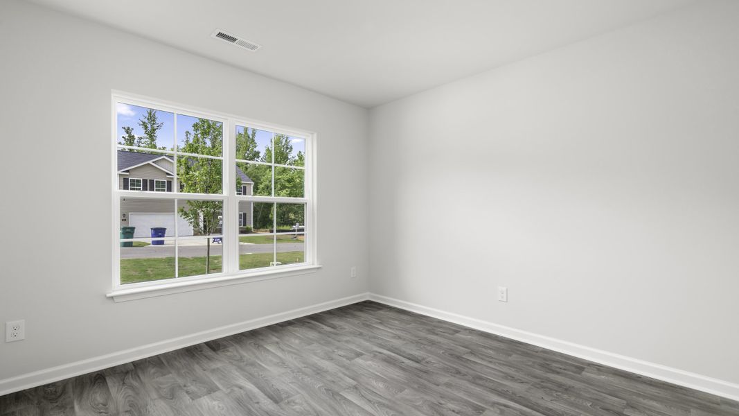 Spacious, unfurnished interior of a new home in Greystone North, Stoneville (Image 10).