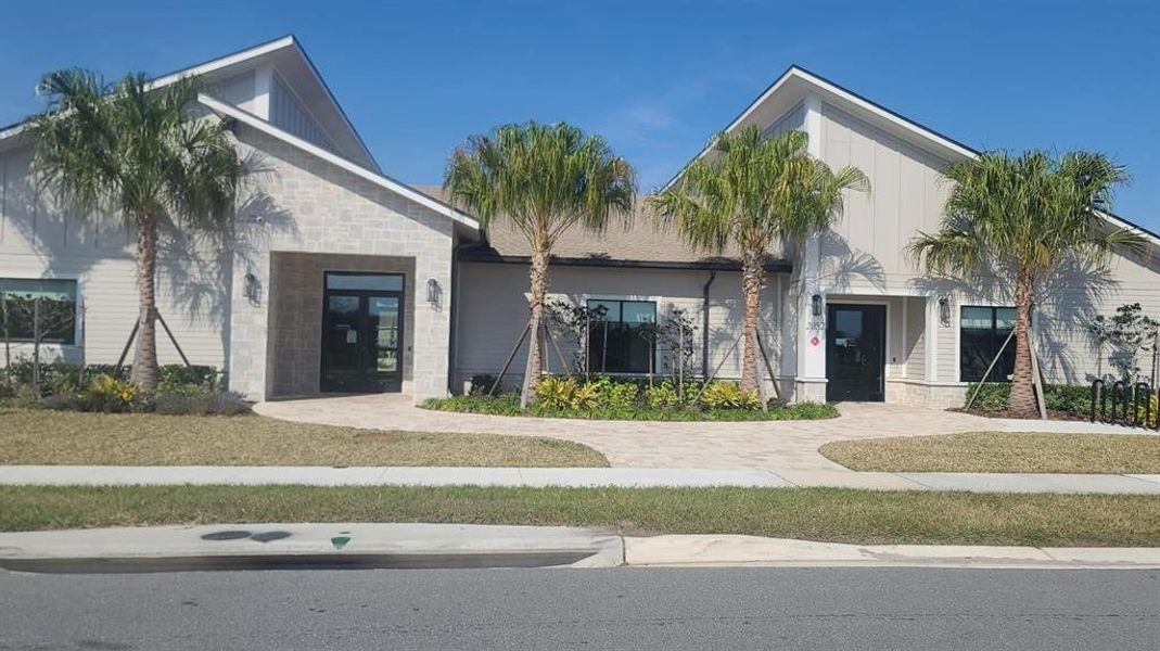 Front exterior of a new home in Storey Creek, Kissimmee, FL, highlighting curb appeal (Image 18).