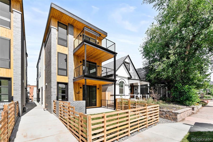 Front exterior of a new home in , Denver, CO, highlighting curb appeal (Image 13).