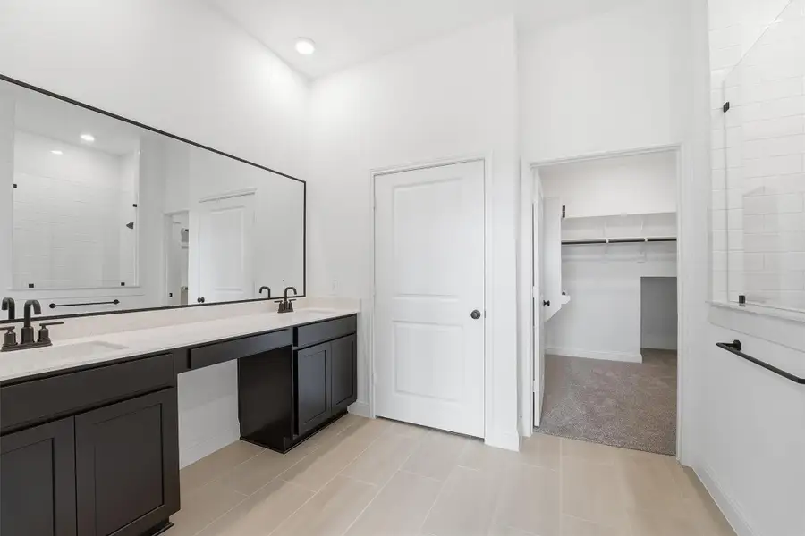 Furnished interior view inside a new home in Bridgeland, Cypress (Image 7).