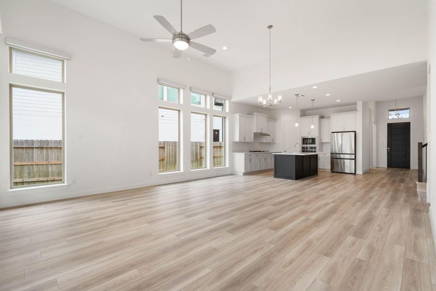 The open concept and high ceilings on the main level make this area feel so spacious.