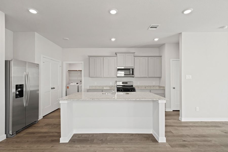 Furnished interior view inside a new home in Riverwood Ranch, Angleton (Image 8).