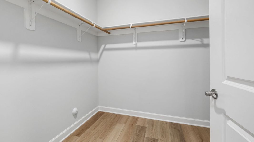 Spacious, unfurnished interior of a new home in The Courtyards at Oak Grove, Durham (Image 22).