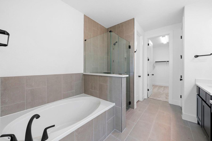 Primary Bath retreat with garden tub & walk-in shower Primary Bath retreat with garden tub & walk-in shower