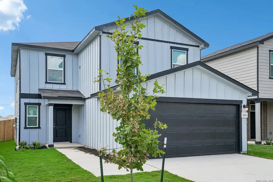 Front exterior of a new home in Medina Crossing, Von Ormy, TX, highlighting curb appeal (Image 17).
