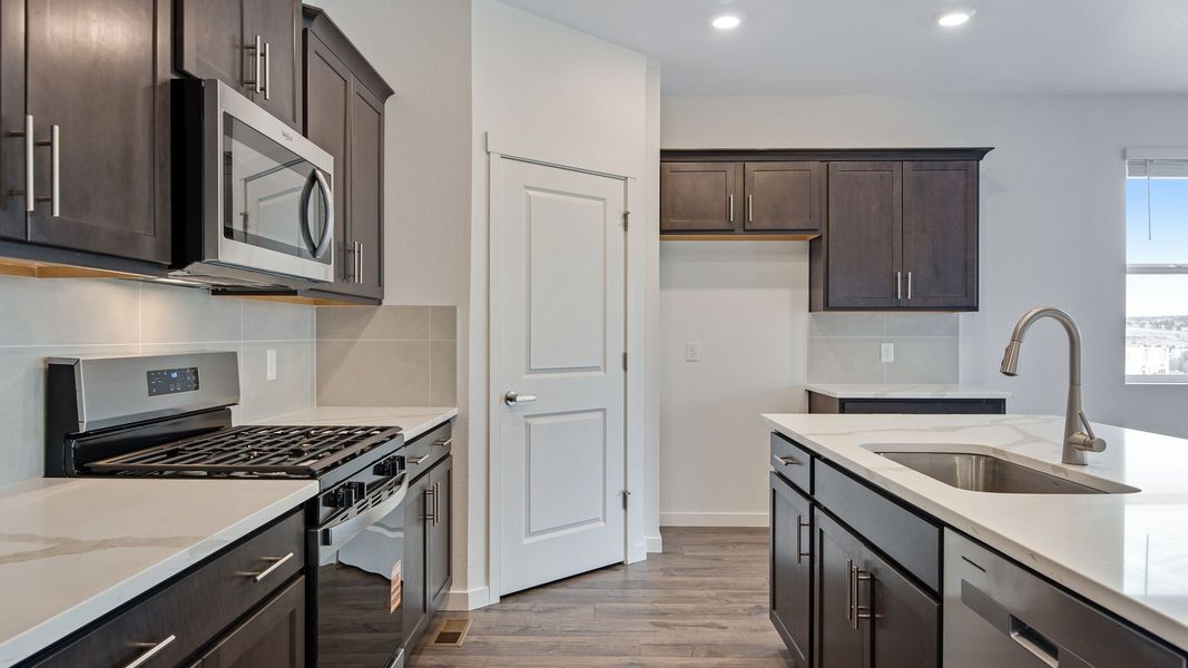 Furnished interior view inside a new home in Trails at Crowfoot, Parker (Image 5).