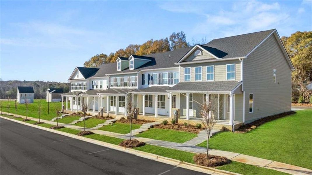 Front exterior of a new home in Brookland Commons, Monroe, GA, highlighting curb appeal (Image 21).
