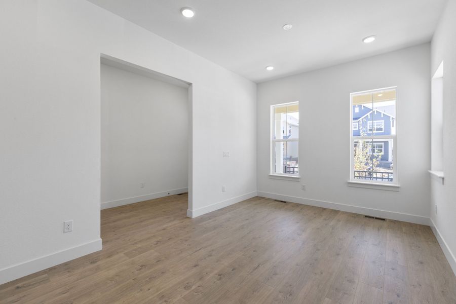 Representative unfurnished interior of a home built from the Journey Series - Varra by Brightland Homes in Dillon Pointe - Skyview, Broomfield (Image 10).