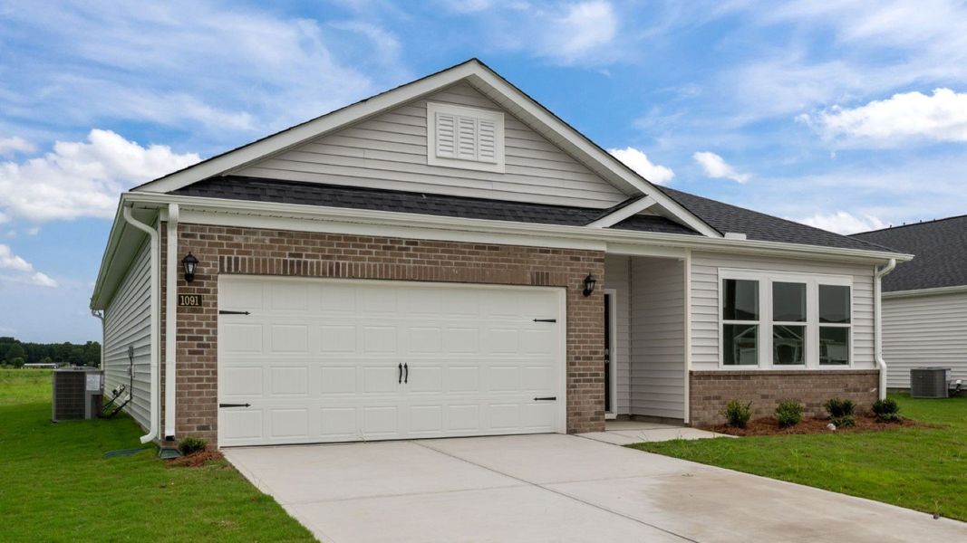 Front exterior of a new home in East Ridge, Ayden, NC, highlighting curb appeal (Image 2).