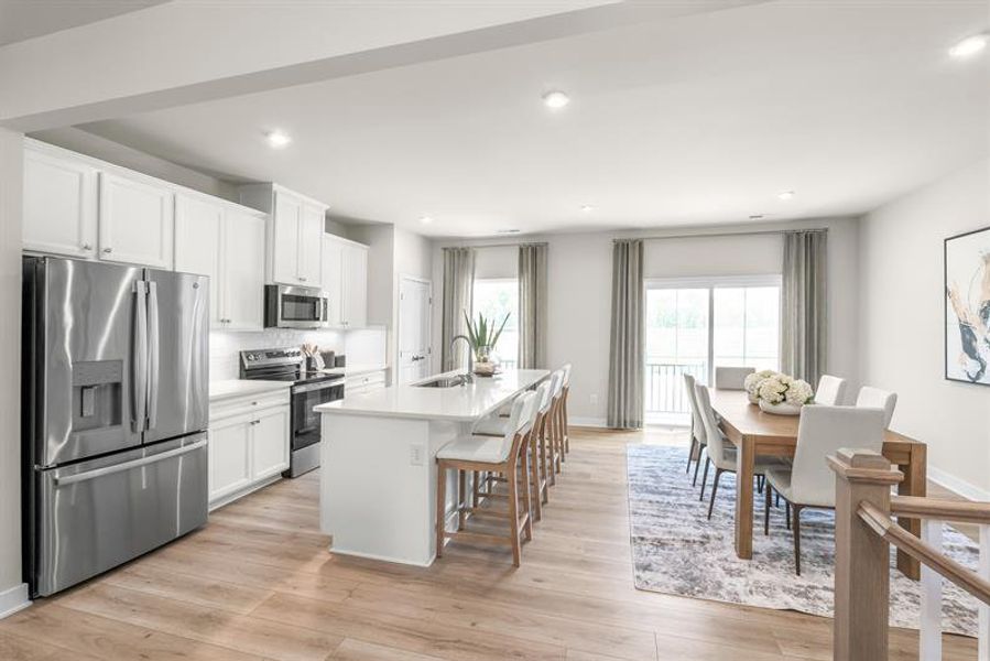 Representative furnished interior of a home built from the Mendelssohn by Ryan Homes in Stowe Branch Townhomes, Charlotte (Image 3).