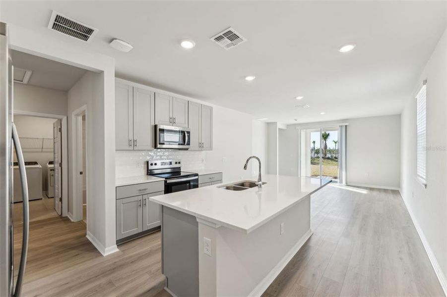 Furnished interior view inside a new home in Crescent Lakes - Premier Series, Punta Gorda (Image 8).