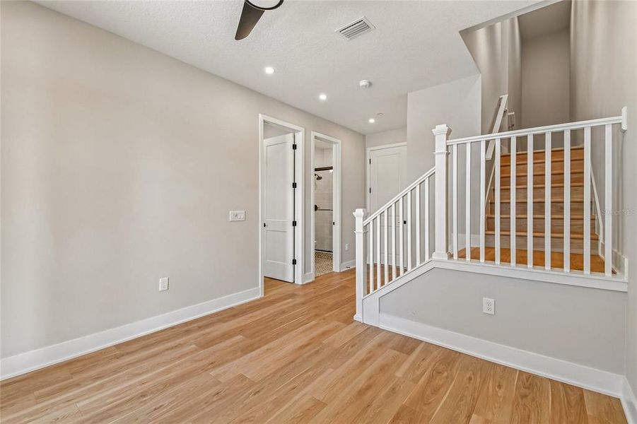 Spacious, unfurnished interior of a new home in EvenTide, New Smyrna Beach (Image 20).