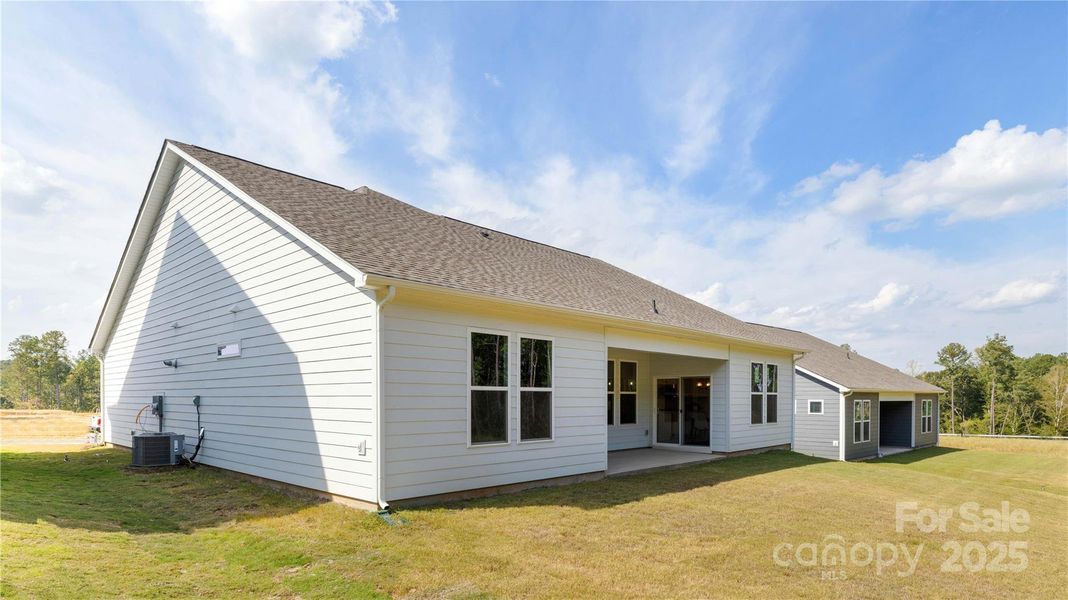 Exterior details and patio area of a home in Westport, York (Image 21). Exterior details and patio area of a home in Westport, York (Image 21).