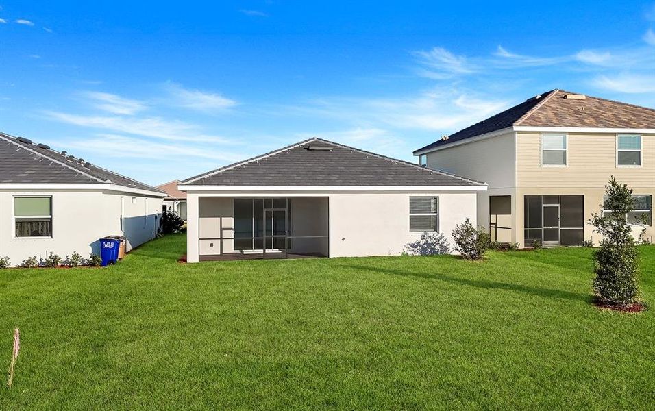 Exterior details and patio area of a home in Hampton Lakes at River Hall, Alva (Image 3).