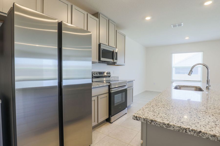 Representative furnished interior of a home built from the Springfield by Maronda Homes in Malabar Springs, Palm Bay (Image 4).