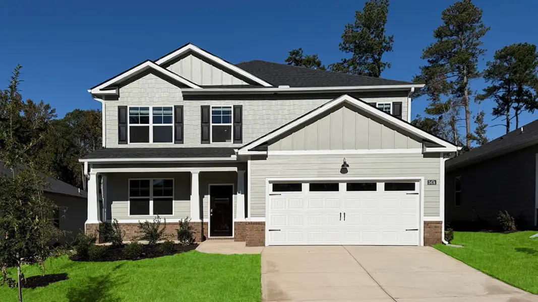 Front exterior of a new home in Wrenfield at Chanticleer, North Augusta, SC, highlighting curb appeal (Image 1). Front exterior of a new home in Wrenfield at Chanticleer, North Augusta, SC, highlighting curb appeal (Image 1).