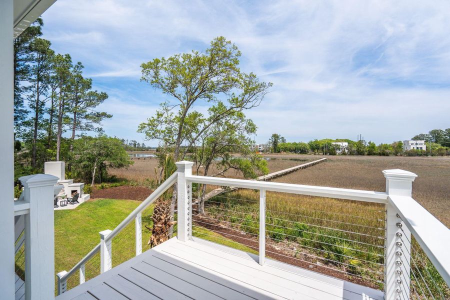 Exterior details and patio area of a home in , Johns Island (Image 31).