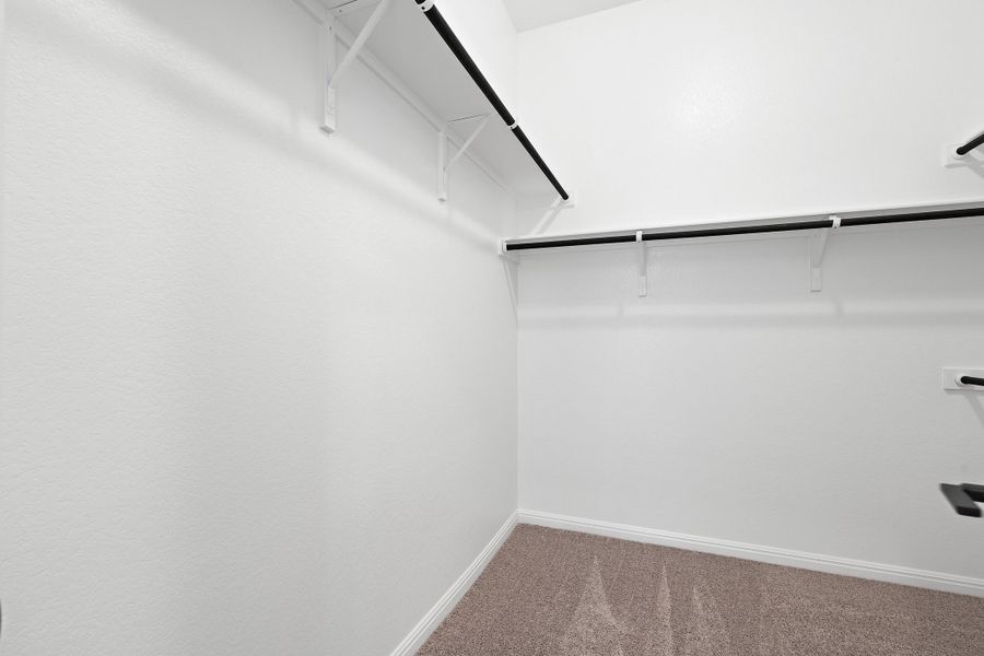 Representative unfurnished interior of a home built from the Waterville by Ashton Woods in The Trails at Carmel, Pflugerville (Image 65).