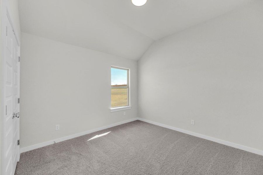 Bedroom in the Pecos home plan by Trophy Signature Homes – REPRESENTATIVE PHOTO