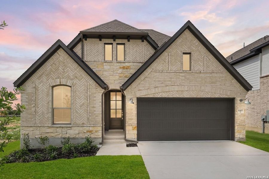 Front exterior of a new home in Nopal Valley, San Antonio, TX, highlighting curb appeal (Image 2). Front exterior of a new home in Nopal Valley, San Antonio, TX, highlighting curb appeal (Image 2).