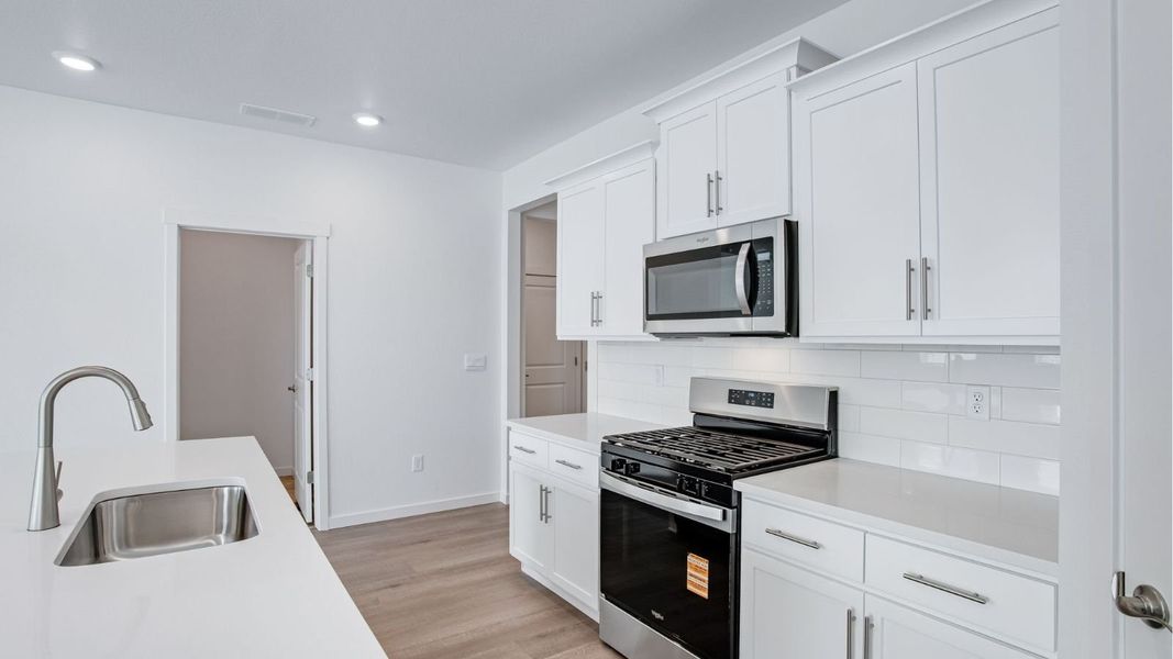Furnished interior view inside a new home in Tailholt, Severance (Image 5).