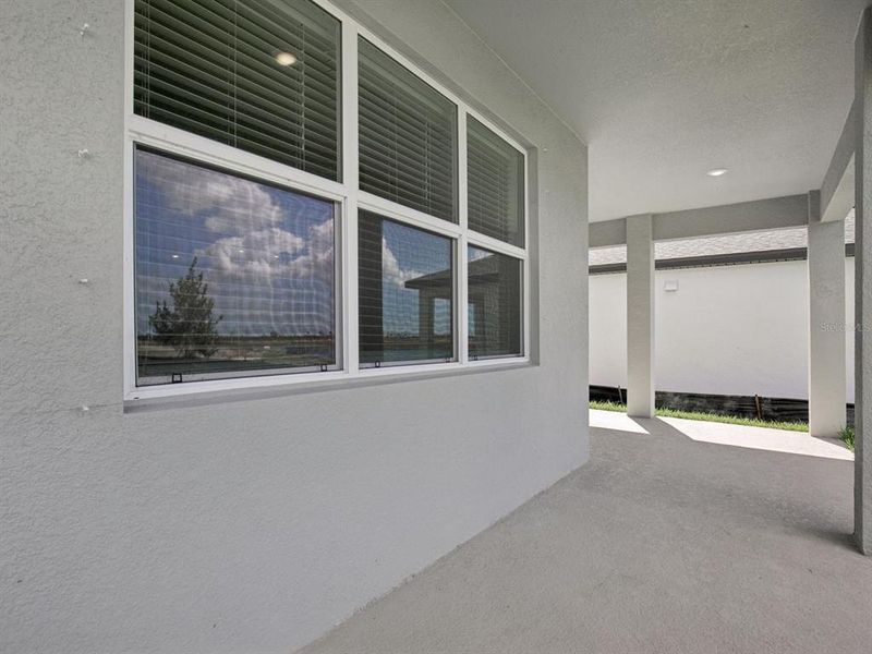 Exterior details and patio area of a home in Coasterra - Reserve Series, Palmetto (Image 25).