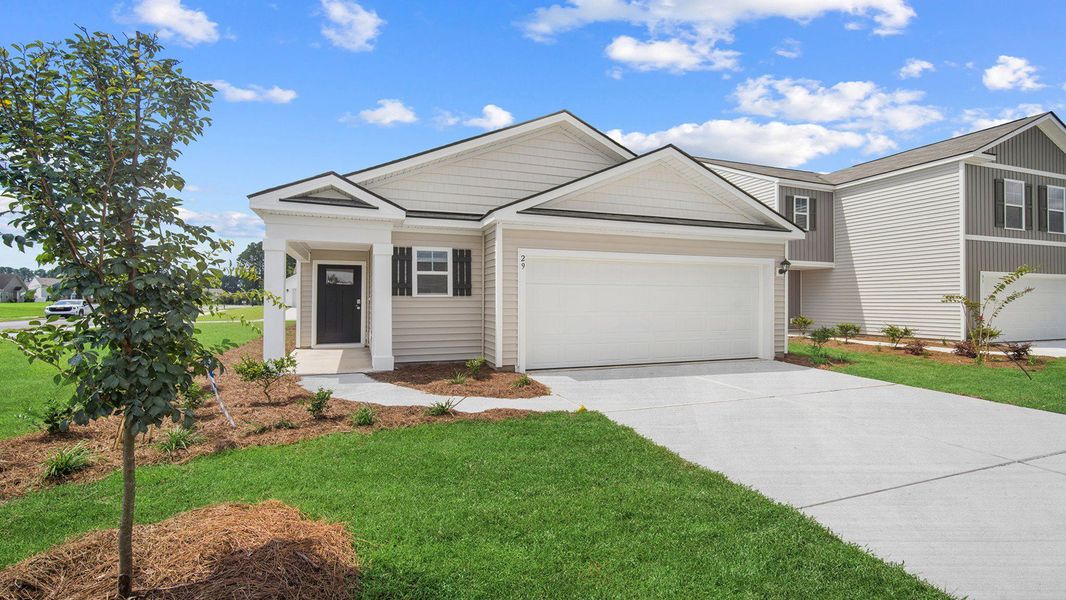 Front exterior of a new home in Rice Hope, Port Wentworth, GA, highlighting curb appeal (Image 1).