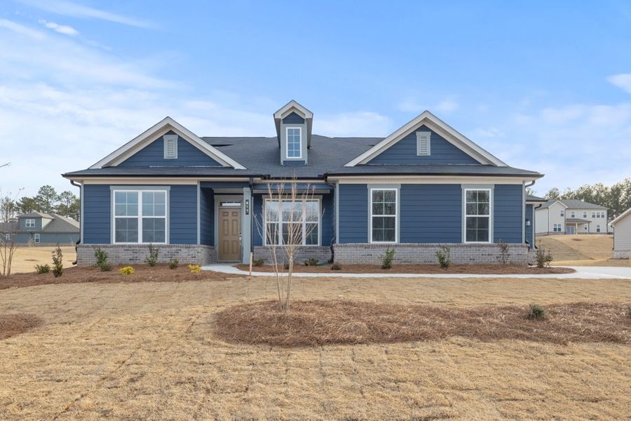 A house with a dirt yard. A house with a dirt yard.