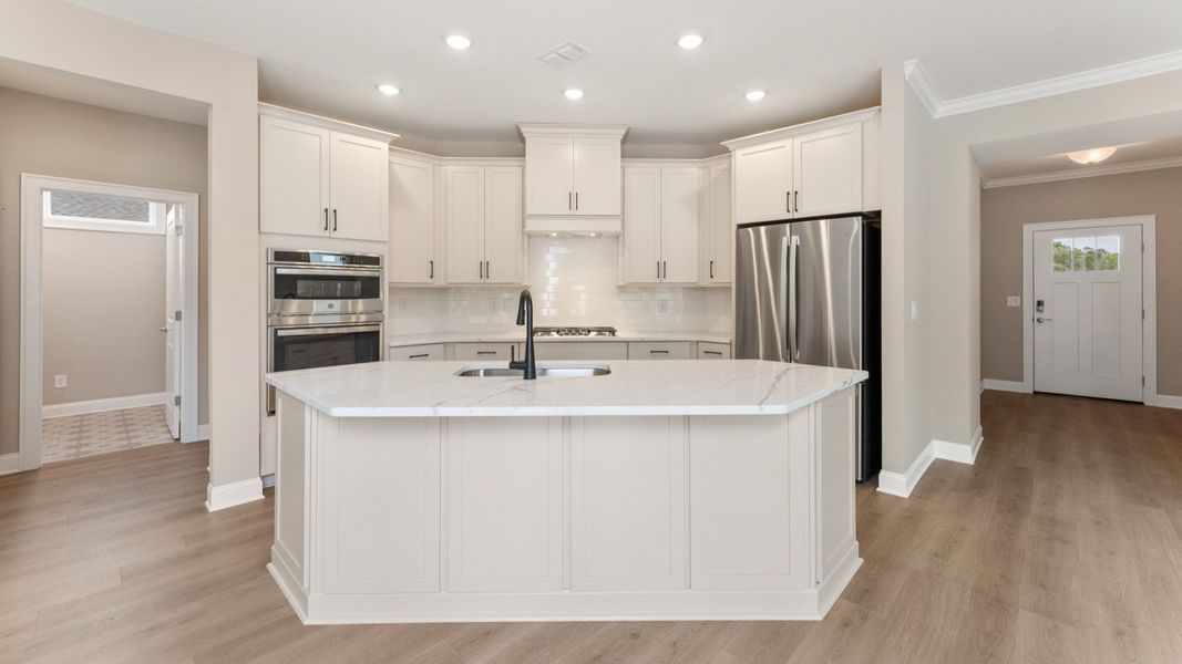 Furnished interior view inside a new home in The Courtyards at Bailey Farms, Dacula (Image 8).