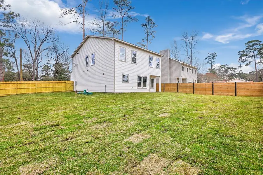 Expansive backyard perfect for entertaining.