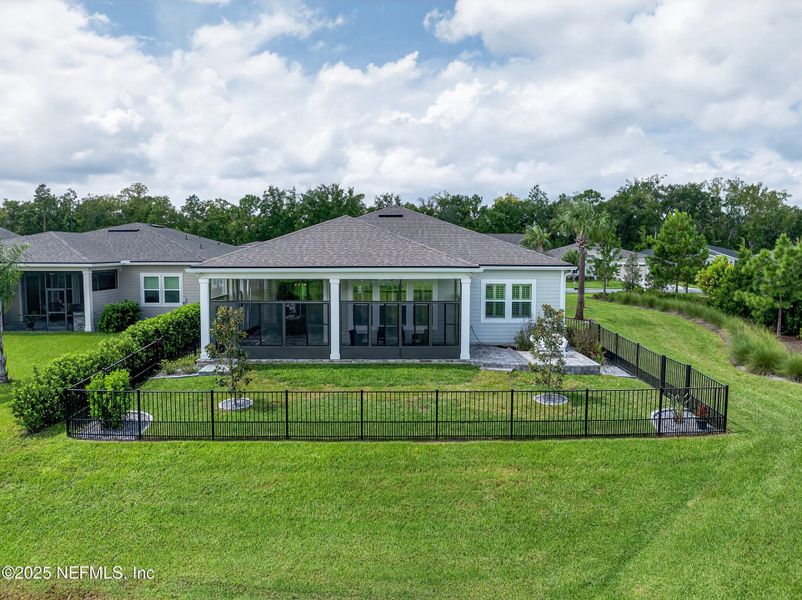 Front exterior of a new home in , St. Johns, FL, highlighting curb appeal (Image 2). Front exterior of a new home in , St. Johns, FL, highlighting curb appeal (Image 2).