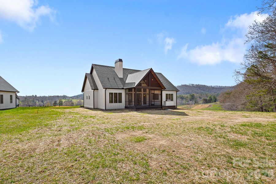 Exterior details and patio area of a home in , Fletcher (Image 32).