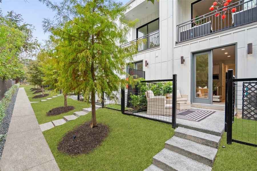 Exterior details and patio area of a home in Bluebonnet Lofts, Austin (Image 24). Exterior details and patio area of a home in Bluebonnet Lofts, Austin (Image 24).