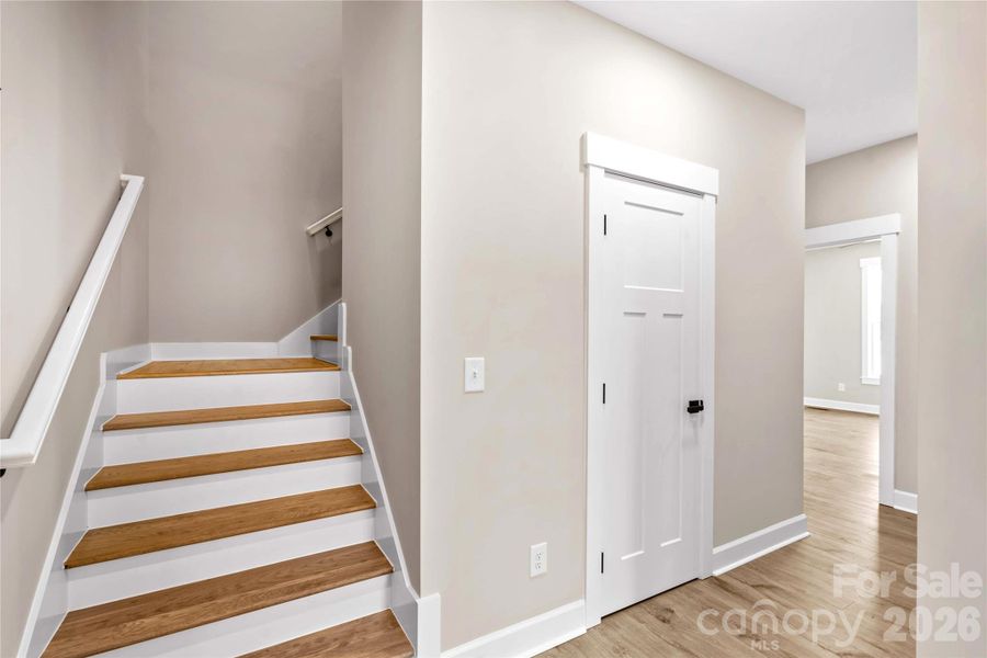 Stairs to the one Bedroom & two Bonus rooms up.