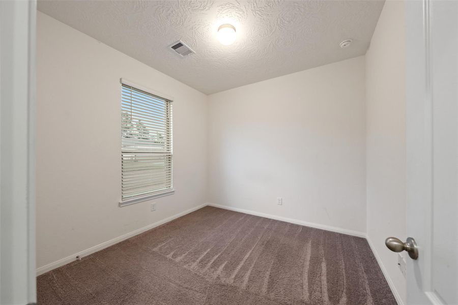Spacious, unfurnished interior of a new home in Grace Landing, Willis (Image 14).