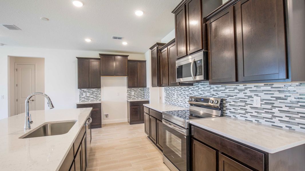 Representative furnished interior of a home built from the Naples by Maronda Homes in Golden Gate, Naples (Image 7).