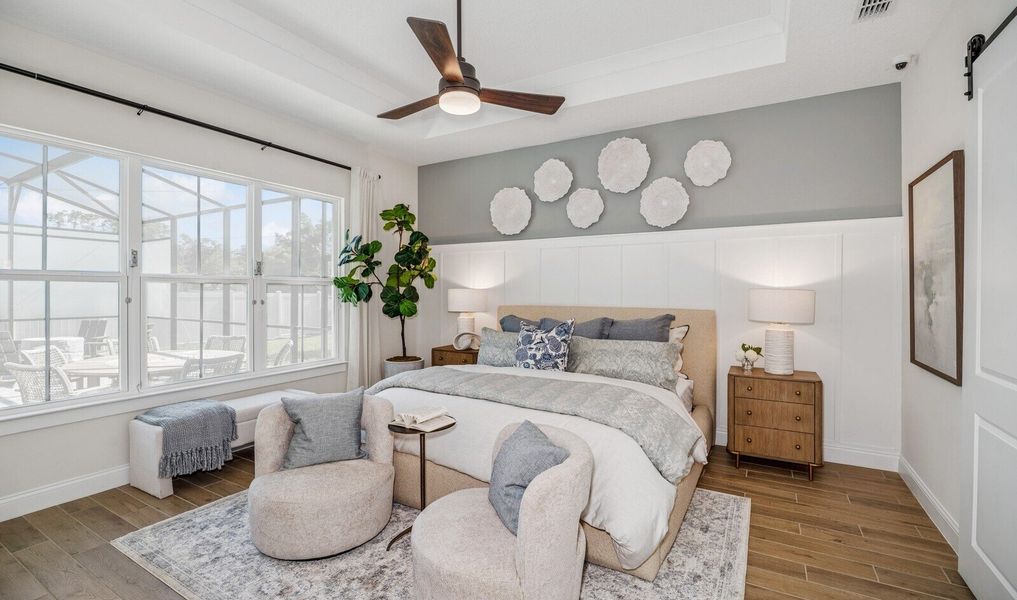 Primary suite with decorative feature wall