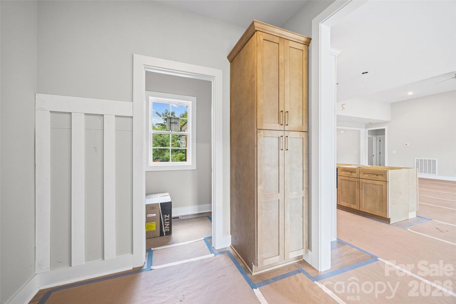 A convenient storage area off the garage entrace.