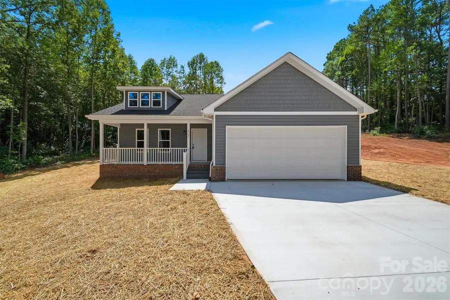 Front exterior of a new home in , Conover, NC, highlighting curb appeal (Image 17).