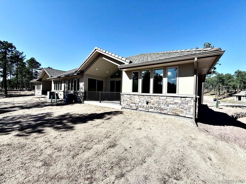 Exterior details and patio area of a home in , Colorado Springs (Image 15). Exterior details and patio area of a home in , Colorado Springs (Image 15).