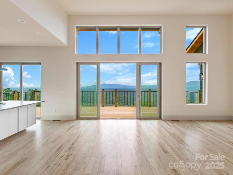 Great room with a wall of windows to capture the views