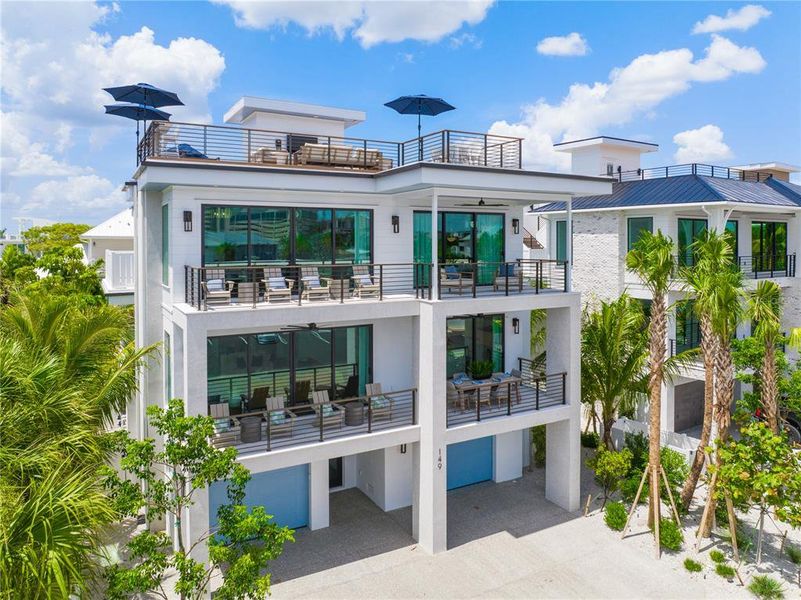 Front exterior of a new home in , Sarasota, FL, highlighting curb appeal (Image 17). Front exterior of a new home in , Sarasota, FL, highlighting curb appeal (Image 17).