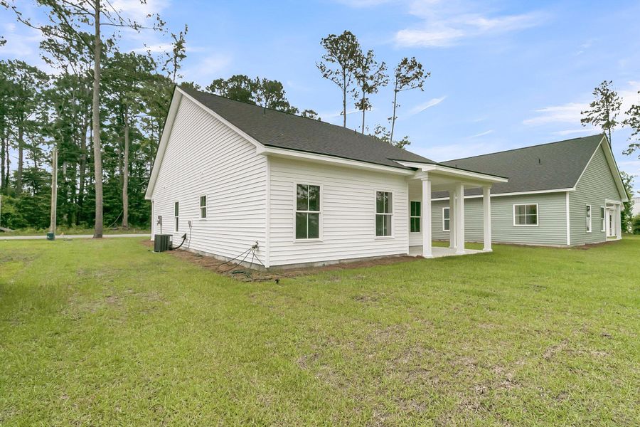 Front exterior of a new home in , Ladson, SC, highlighting curb appeal (Image 24).