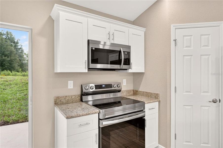 Furnished interior view inside a new home in , Dunnellon (Image 9).