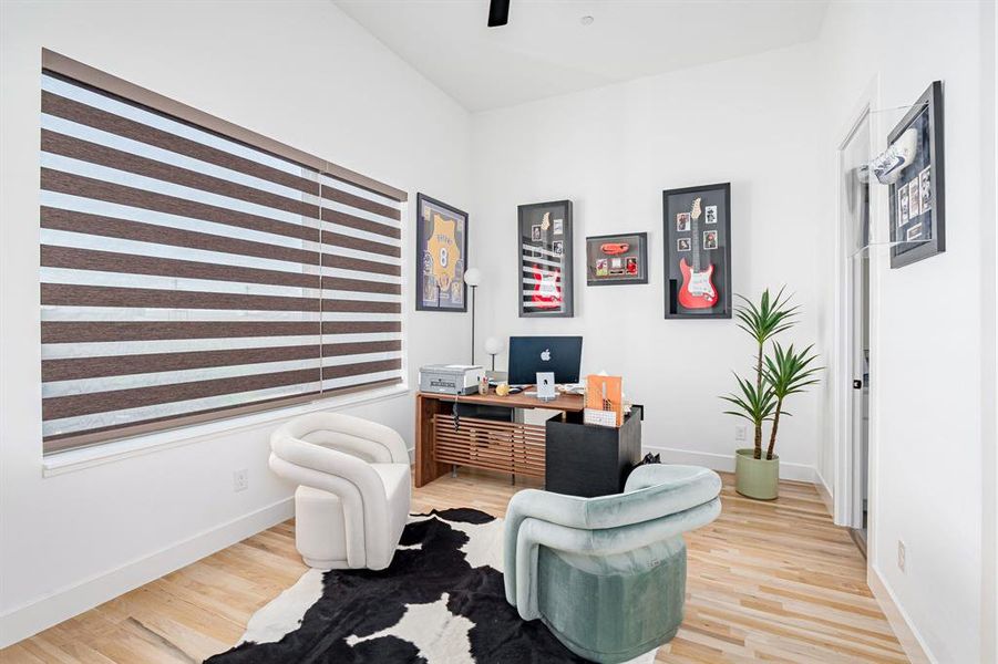 Office area featuring wood-type flooring