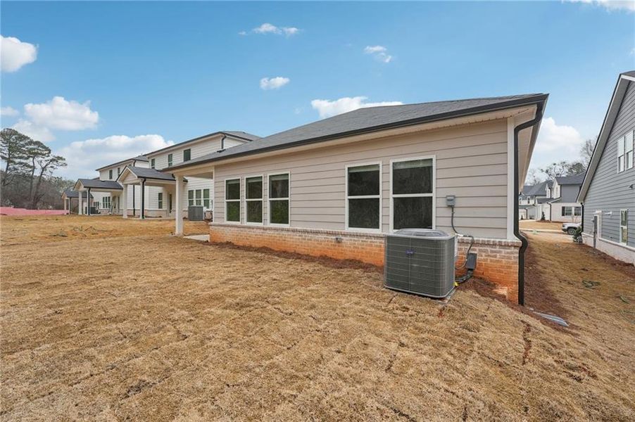 Exterior details and patio area of a home in Westmont Preserve, Powder Springs (Image 31).