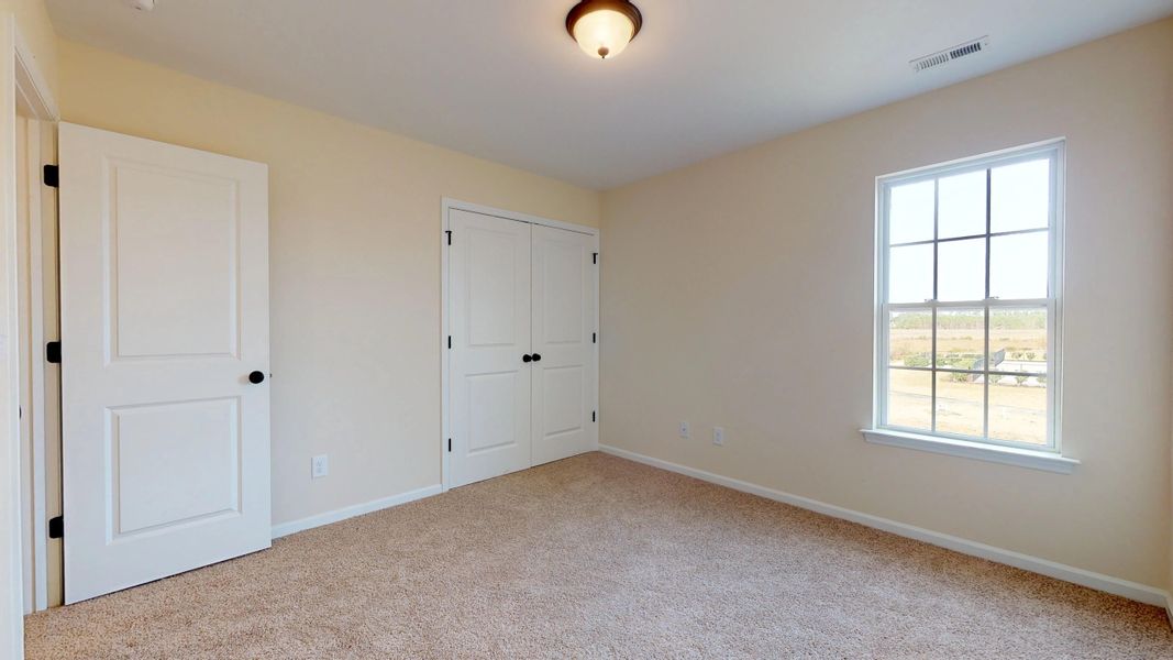 Representative unfurnished interior of a home built from the Rockbridge by Bill Clark Homes in Davenport Farms, Winterville (Image 55).